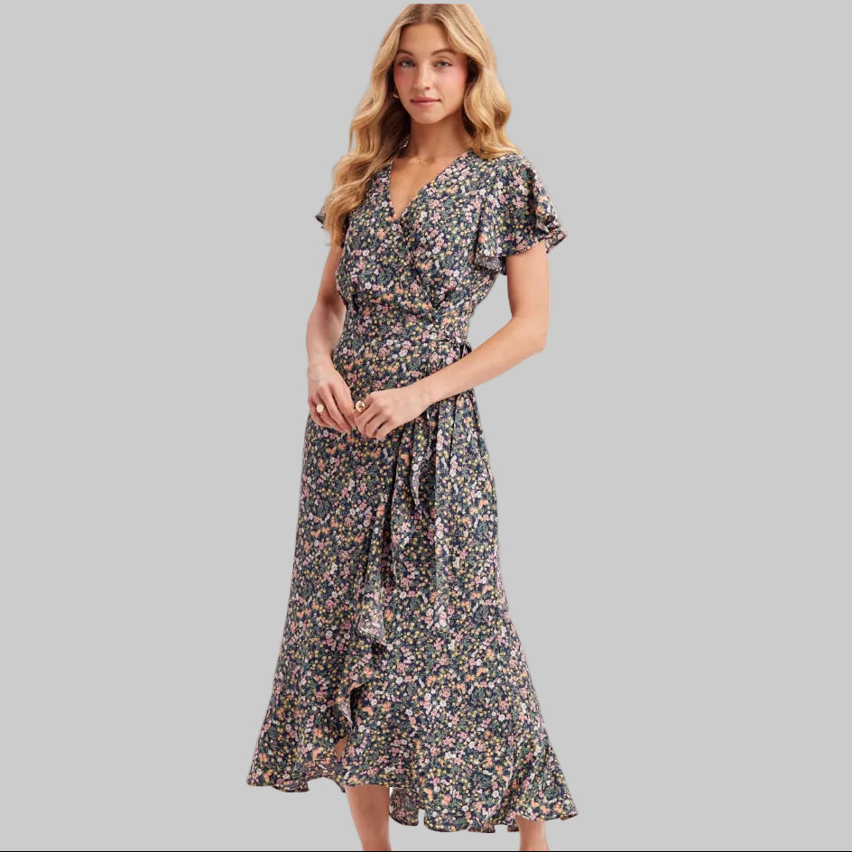 Woman wearing a floral dress on a white background