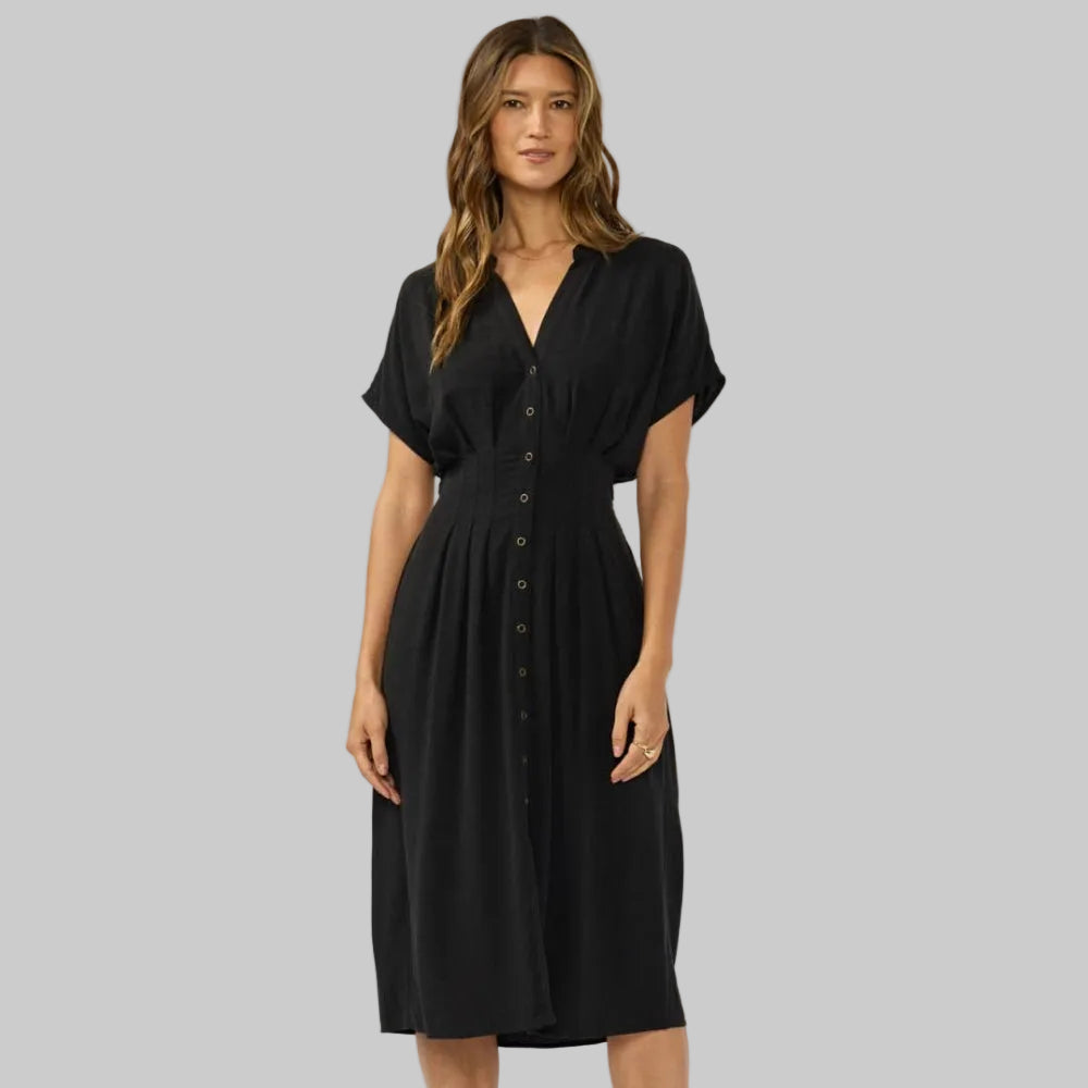 Woman wearing a black dress on a white background
