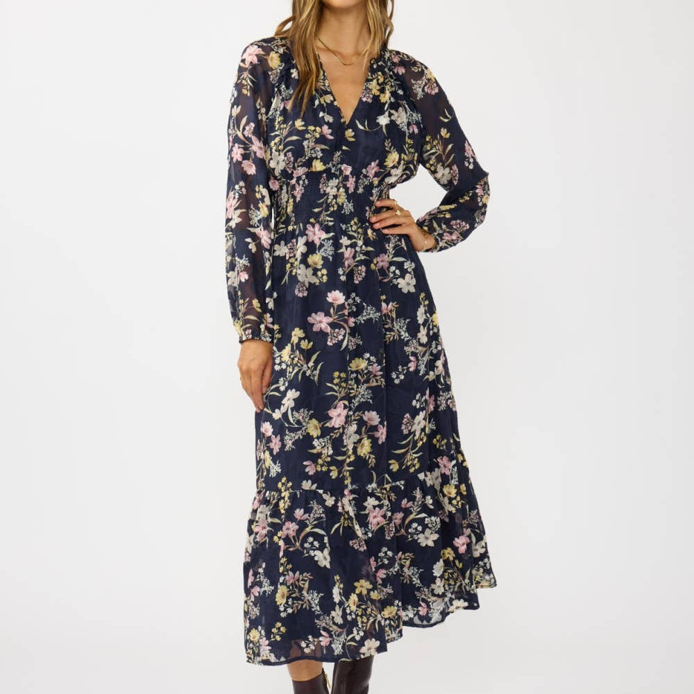 Woman wearing a floral dress on a white background