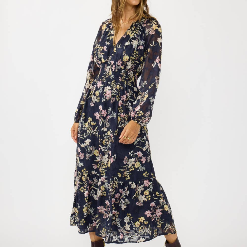 Woman wearing a floral dress on a white background