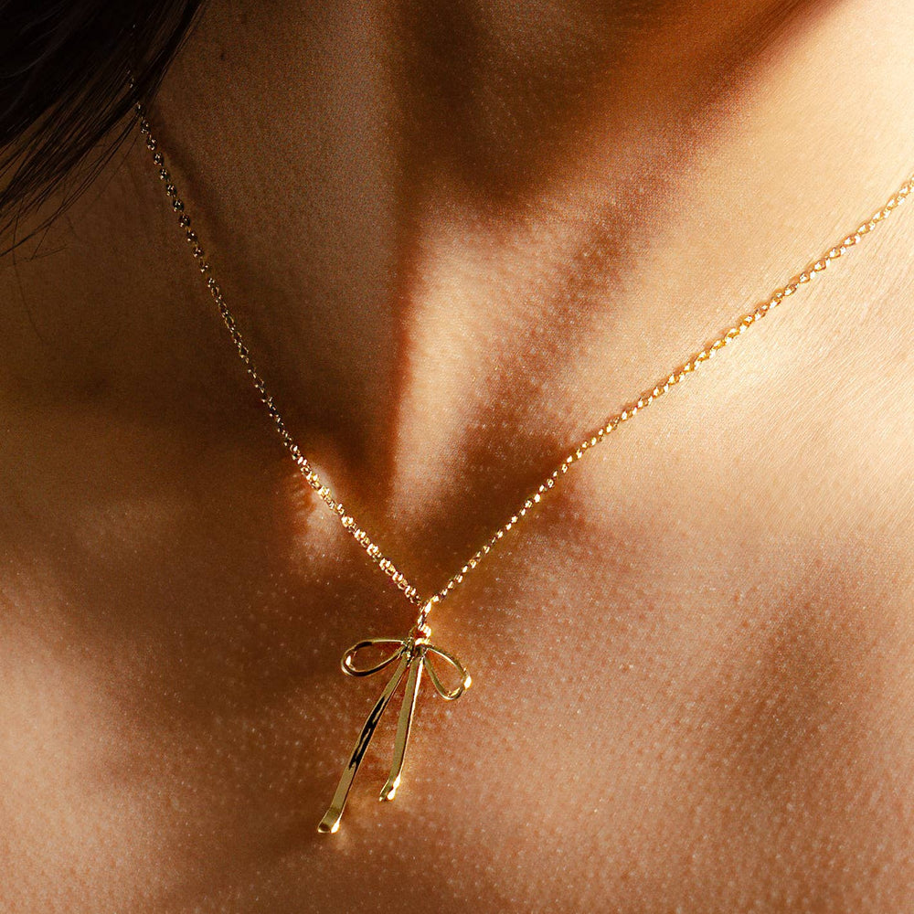 
                      
                        Bow Necklace - 18K Gold Plated
                      
                    