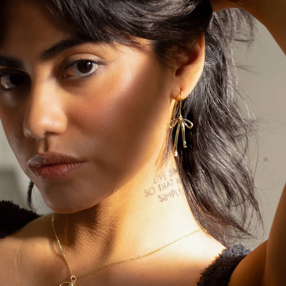
                      
                        Bow Necklace - 18K Gold Plated
                      
                    