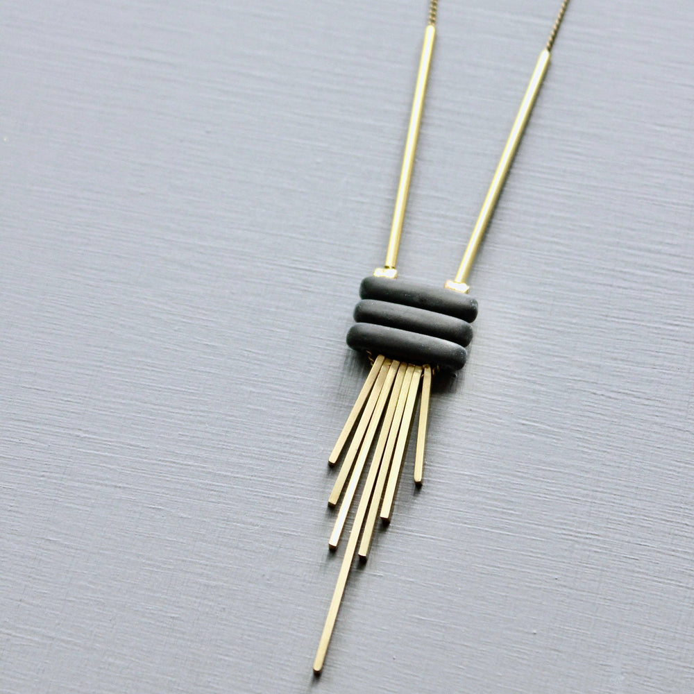 
                      
                        Black and Brass Fringe Necklace
                      
                    