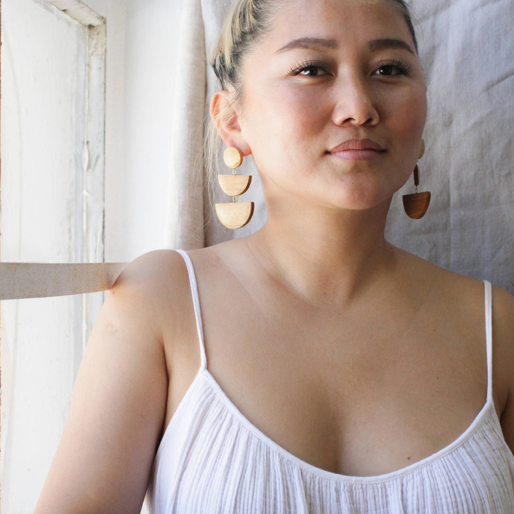 
                      
                        Wood Triad Earrings
                      
                    
