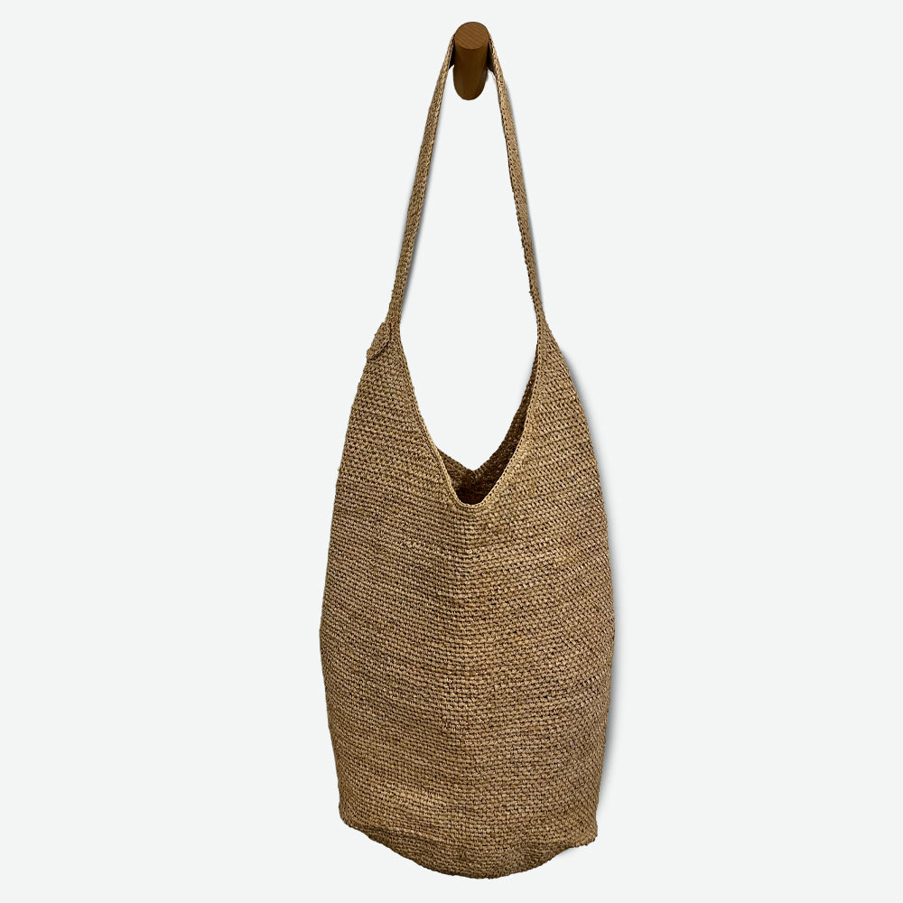 Woven handbag on a white background