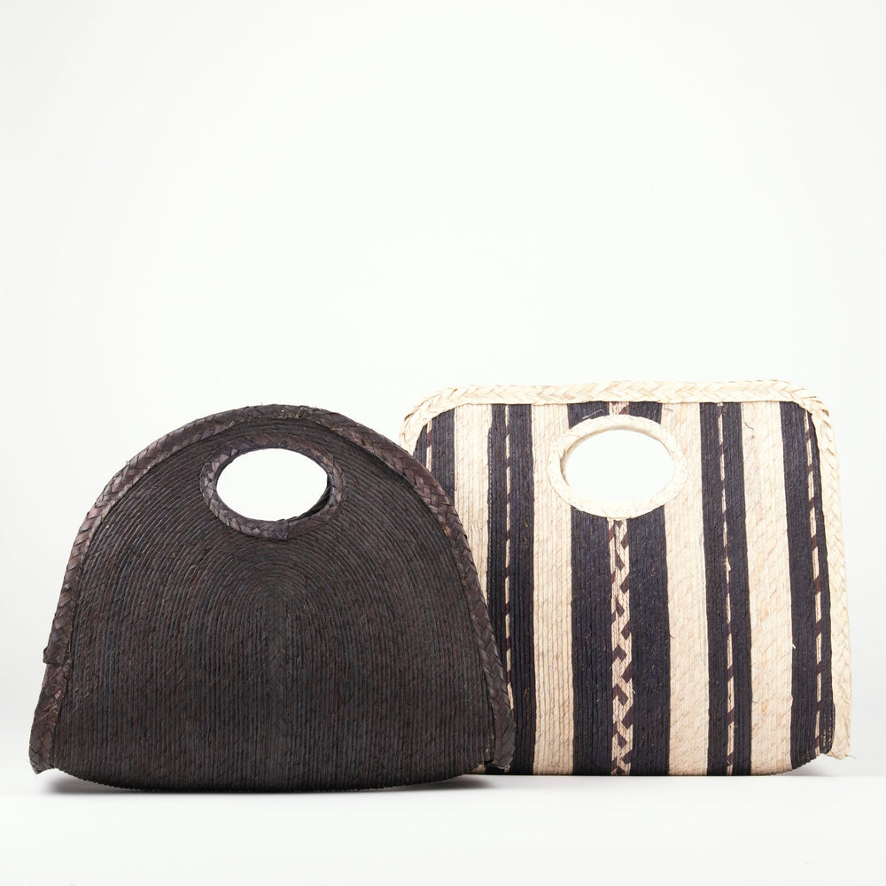 
                      
                        Capri Handheld Tote in Black
                      
                    