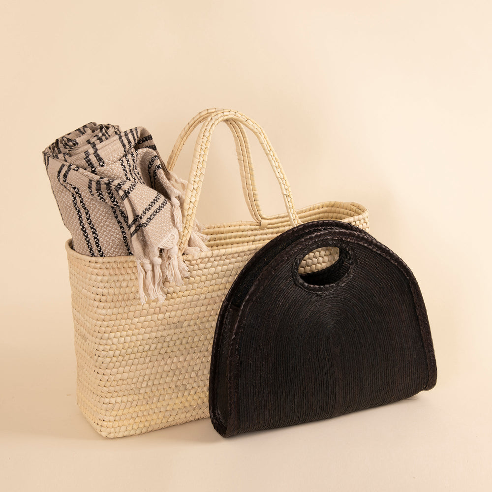 
                      
                        Capri Handheld Tote in Natural
                      
                    